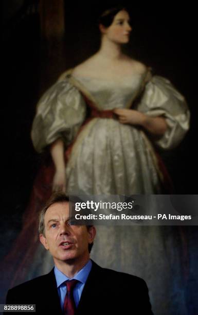 Prime Minister Tony Blair standing in front of Augusta Ada Byron, Countess of Lovelace, by Margaret Carpenter, during a press conference at Downing...