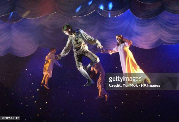 Actors Jack Blumenau , who plays Peter Pan, and Katie Foster-Barnes who plays Wendy during a photocall for Peter Pan at the Savoy Theatre in central...