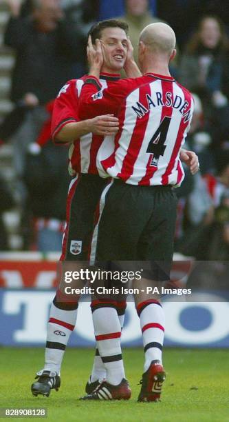 Southampton's Jason Dodd celebrates with Chris Marsden after scoring the opening goal against local rivals Portsmouth in the Barclaycard Premiership...