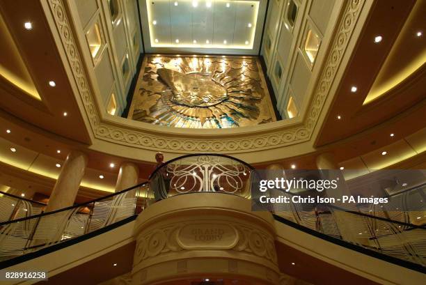 John McKenna's frieze in the Grand Lobby of Cunard's Queen Mary 2, the newest and largest cruise ship in the world at Southampton docks. She will be...