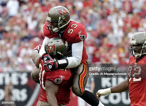 Tampa Bay Buccaneers defenders Shelton Quarles and Chartric Darby celebrate a stop against the Houston Texans at Raymond James Stadium, Tampa,...