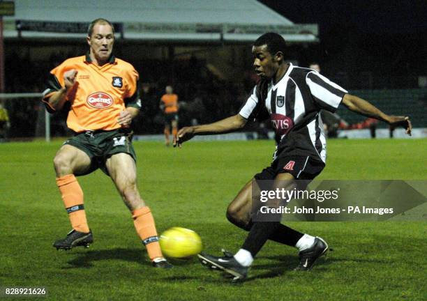 Grimbsy's Simon Ford in action with Marino Keith of Plymouth, during the Nationwide Division two match at Blundell Park, Grimsby. PA Final score:...