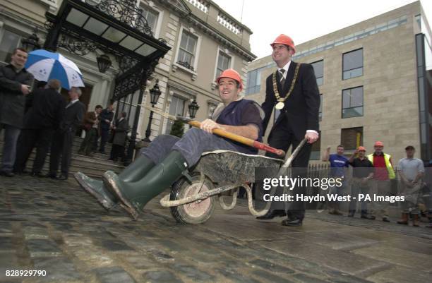 Lord Mayor Royston Brady and Niall Mellon pose for photos before a civic reception at the Mansion House, Dublin, Ireland, honouring Mr Mellon's role...