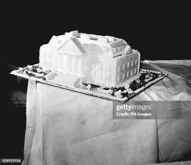 The 140lb wedding cake for Lady Pamela Mountbatten and Mr David Hicks at Romsey Abbey, Hampshire. The cake is a replica of Broadlands, the Romsey...