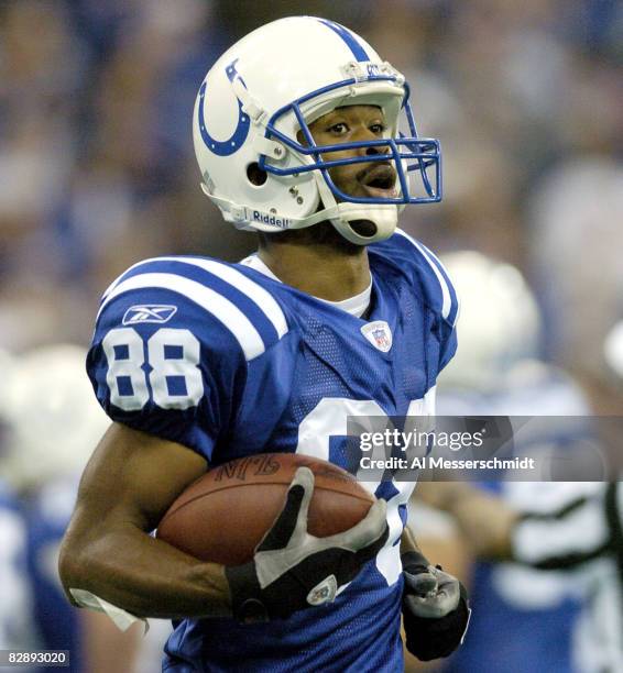Indianapolis Colts wide receiver Marvin Harrison celebrates a touchdown catch at the RCA Dome, Indianapolis, Indiana, January 4, 2004 in an AFC...