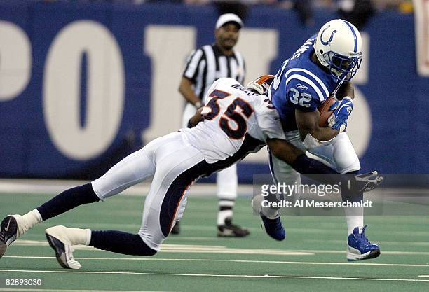 Indianapolis Colts running back Edgerrin James rambles for a gain at the RCA Dome, Indianapolis, Indiana, January 4, 2004 in an AFC wildcard playoff...