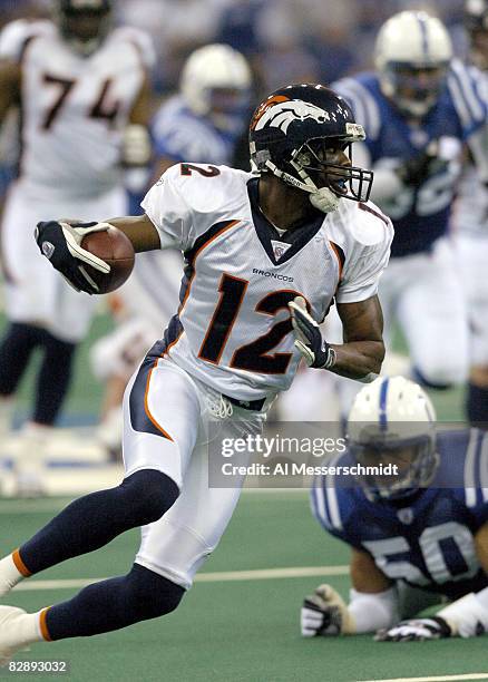 Denver Broncos wide receiver Charlie Adams grabs a pass at the RCA Dome, Indianapolis, Indiana, January 4, 2004 in an AFC wildcard playoff game.