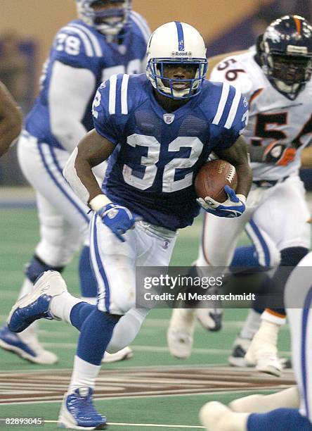 Indianapolis Colts running back Edgerrin James rushes for a gain January 4, 2004 at the RCA Dome, Indianapolis, in an AFC Wildcard game. The Colts...