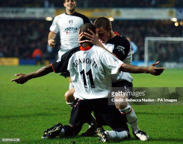 Fulham's Lee Clark celebrates with team mate Luis Boa Morte after scoring against Aston Villa during the Barclaycard Premiership match at Loftus...