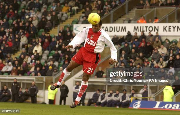 Coventry City's Julian Joachim heads his side in front during their Nationwide Division One match against Wimbledon at Wimbledon's National Hockey...