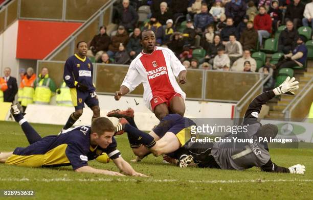 Coventry City's Patrick Suffo sees his shot ricochet past Wimbledon goalkeeper Steve Banks and into the Wimbledon net during their Nationwide...