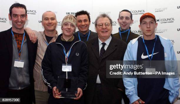 From left to right; Joe Magee, Simon Willis, Mark Kirk, Nick Giles, film director Alan Parker, Cee Jay and Liam Jest from Knowle West Media Centre,...