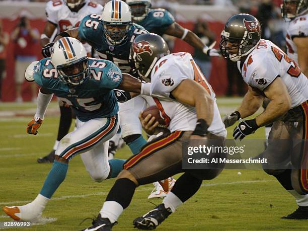 Tim Rudy Nfl Miami Dolphins Reggie Howard Photos and Premium High Res Pictures ...