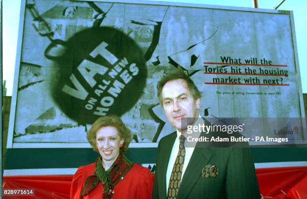 S Margaret Becket and Dr Jack Cunningham, with Labour's newest poster unveiled at the Junction of Vauxhall Bridge and Wandsworth Road in London.