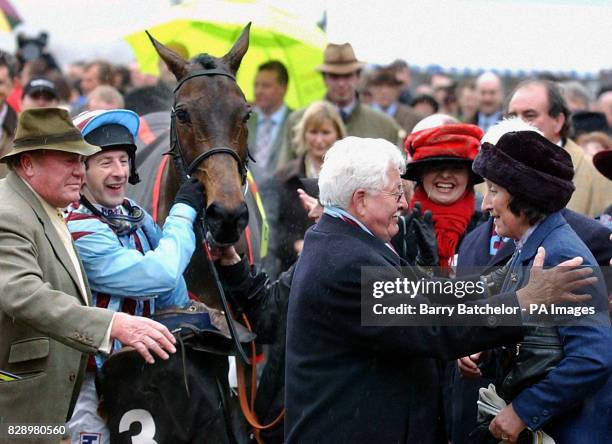 Best Mate with the team after winning the 3.15 Tote Cheltenham Gold Cup with from left to right Terry Biddlecombe Jim Culloty , Jim Lewis and...