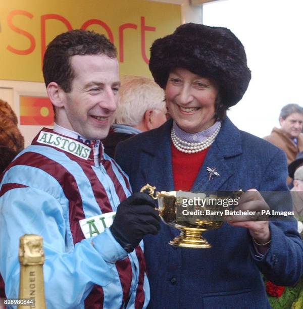 Jockey Jim Culloty and trainer Henrietta Knight with the Tote Cheltenham Gold Cup after their victory with Best Mate in the 3.15 race at Cheltenham...