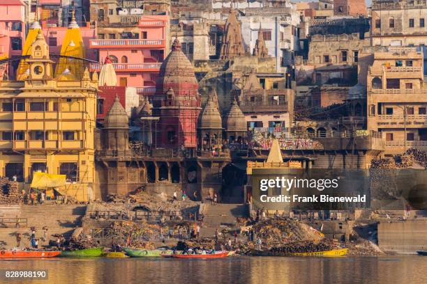 View across the holy river Ganges on Manikarnika Ghat, Burning Ghat, in the suburb Godowlia.