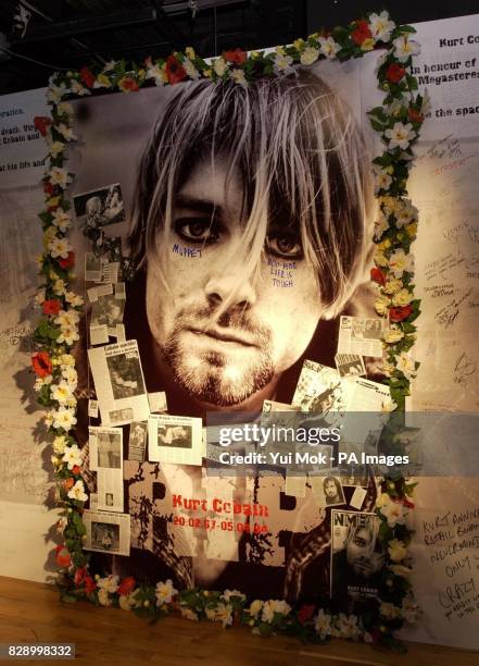 Visitors pay their respects to Kurt Cobain - the American singer-songwriter of the grunge group Nirvana - on the eve of the rock star's suicide on...