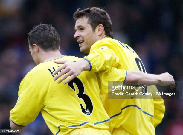 Leeds United's Mark Viduka celebrates his goal with team-mate Ian Harte after scoring the winning goal against Blackburn Rovers during the...