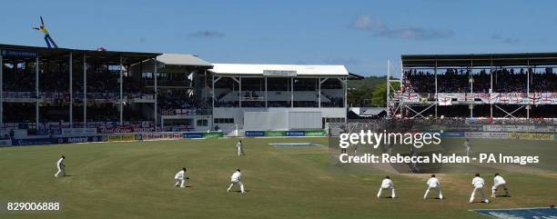 West Indian field after their captain Brian Lara scored 400 runs not out and declared on 751 against England, during the third day of the 4th Test at...