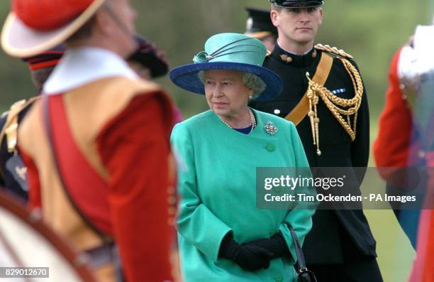 Britain's Queen Elizabeth II inspects the Light Cavalry Division at Windsor Great Park. The Queen today followed in the footsteps of Henry VIII as...
