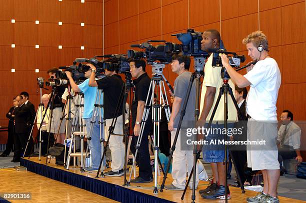 Cameramen at a 2005 American Bowl press conference at the Tokyo Dome Hotel in Japan, Thursday August 4, 2005.