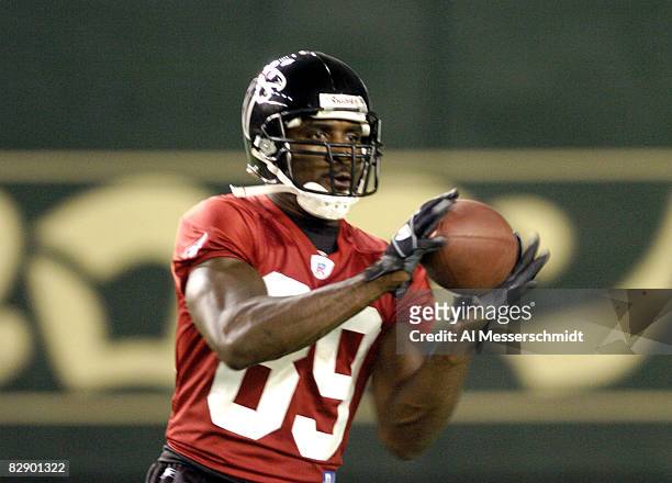 Atlanta Falcons wide receiver Dez White reaches for a pass during a late-night practice at the Tokyo Dome Aug. 3, 2005 in Japan.