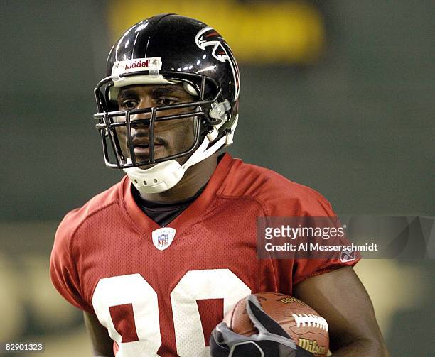 Atlanta Falcons wide receiver Dez White grabs a pass during a late-night practice at the Tokyo Dome Aug. 3, 2005 in Japan.