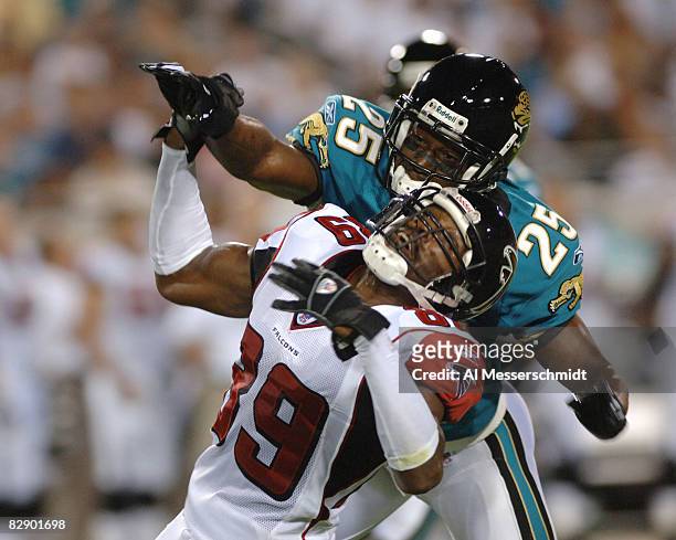 Jacksonville Jaguars cornerback Kenny Wright is called for pass interference as Atlanta Falcons wide receiver Dez White looks for the ball in a...