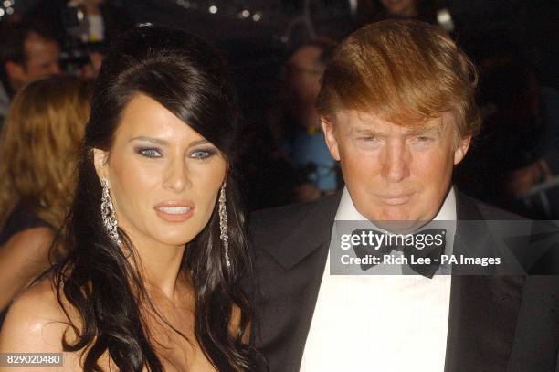 American property tycoon Donald Trump and Melania Knauss arrives for the Costume Institute Gala celebrating Dangerous Liasons: Fashion & Furniture in...