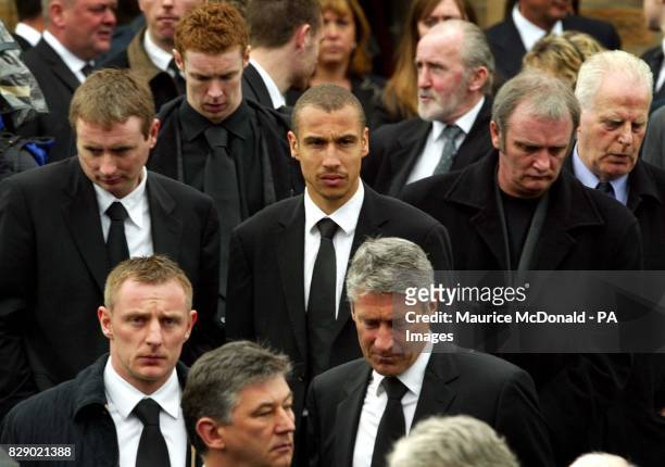 Celtic's Henrik Larsson and goal keeper Robert Douglas leave St Ninians Church in Edinburgh, following the funeral of former Celtic, Newcastle United...