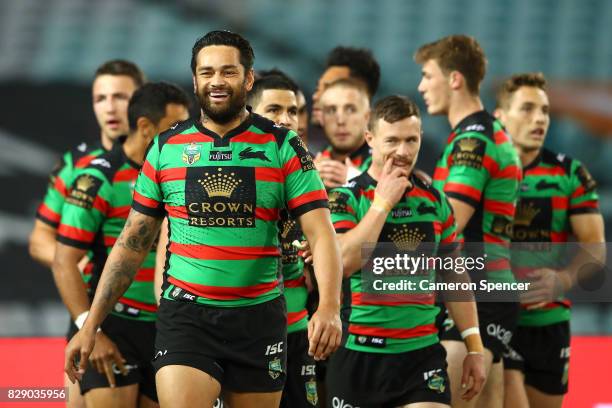 John Sutton of the Rabbitohs smiles after a try by team mate Bryson Goodwin during the round 23 NRL match between the South Sydney Rabbitohs and the...