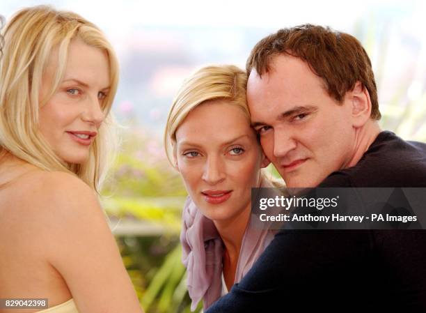 Daryl Hannah, Uma Thurman and Director Quentin Tarantino during a photocall for their latest film Kill Bill Vol 2, today Sunday 16 May 2004, held at...
