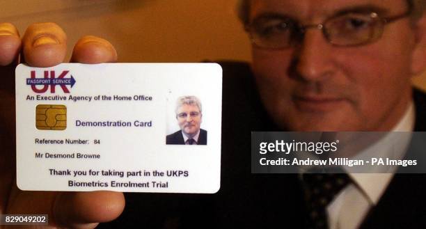 Home Office Minister Des Browne, MP shows his Biometric identity card made at the DVLA office in Glasgow. The Government intends to introduce a...