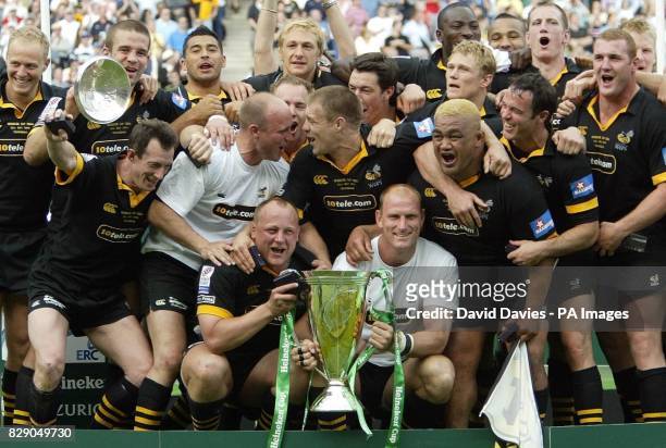 Wasps celebrate with the Cup after their 27-20 victory over Toulouse in the Heineken Cup Final at Twickenham, London.