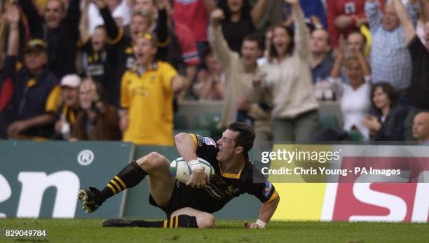 Wasps' Rob Howley celebrates his winning try against Toulouse during the Heineken Cup Final at Twickenham, London.