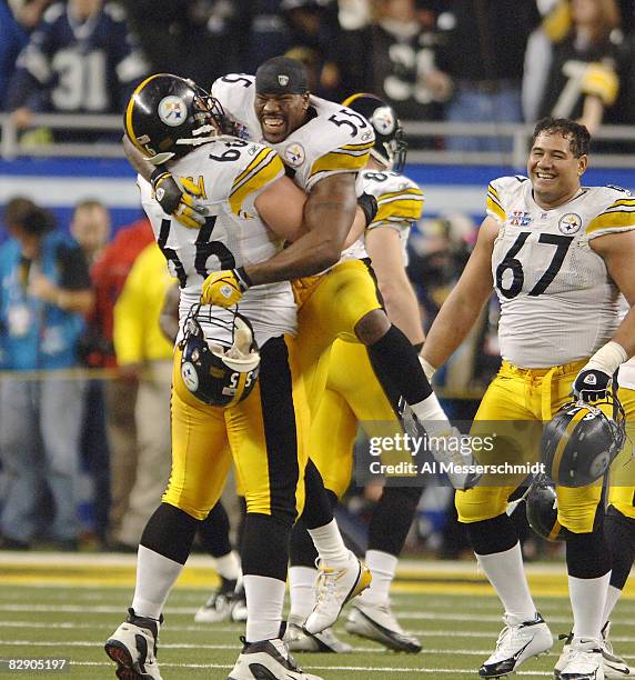 Steelers Joey Porter celebrates with Alan Faneca during Super Bowl XL between the Pittsburgh Steelers and Seattle Seahawks at Ford Field in Detroit,...