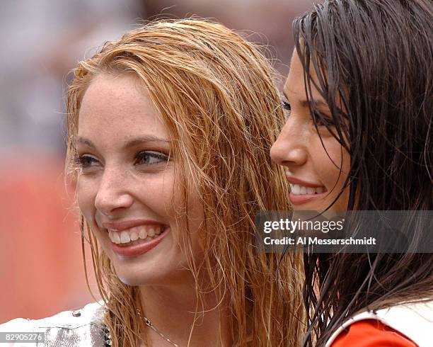 Cheerleaders show wet heads after a sudden first-quarter rain storm falls February 12, 2006 at the Pro Bowl at Aloha Stadium in Honolulu, Hawaii.