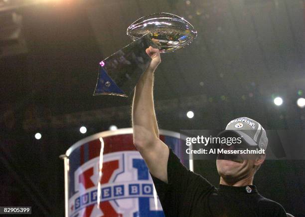 Steelers head coach Bill Cowher holds the Vince Lombardi trophy after the Steelers won Super Bowl XL between the Pittsburgh Steelers and Seattle...