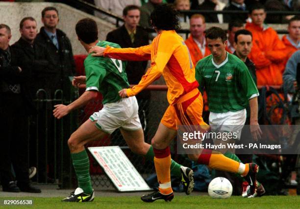 Manchester United and Ireland player, Roy Keane shouts for the ball as Liam Miller dribbles the ball up the wing, in the first half of the Ireland v...