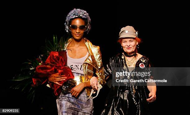 Designer Vivienne Westwood walks down the catwalk with a model after her Red Label show at London Fashion Week Spring/Summer 2009 September 18, 2008...