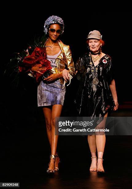 Designer Vivienne Westwood walks down the catwalk with a model after her Red Label show at London Fashion Week Spring/Summer 2009 September 18, 2008...