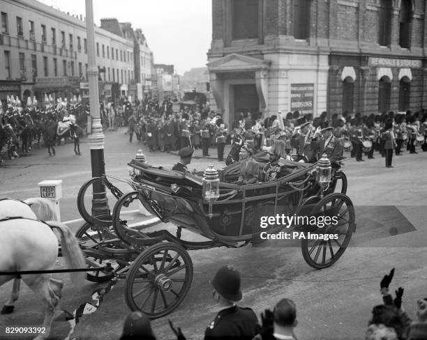 Accompanied by Queen Elizabeth II and the Duke of Edinburgh, Emperor Haile Selassie of Ethiopia and his son, the Duke of Harar, drive in procession...