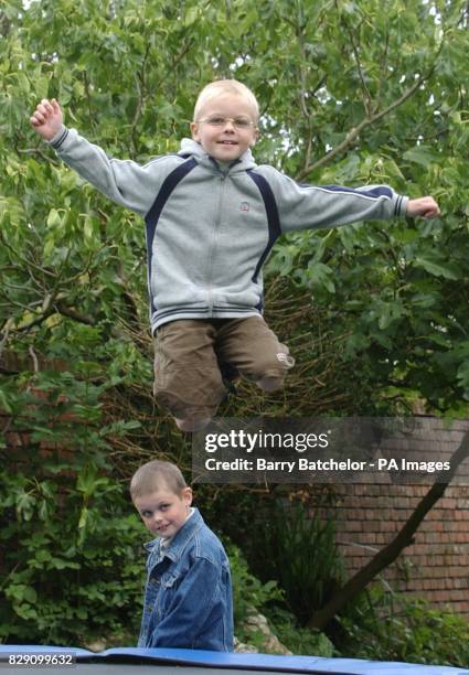 Daniel Hartley, eight, watched by his brother, Nathan at their home in Romsey, Hants. Their father, Mr Hartley has said, that bone marrow matches...