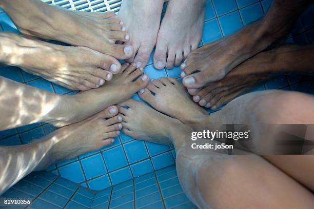 group of people's feet in hot tub - hot filipina women stockfoto's en -beelden