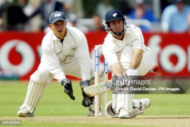 Yorkshire's Michael Vaughan sweeps a delivery from Gloucestershire's Martyn Ball under the watchful eye of wicketkeeper Stephen Adshead during the...