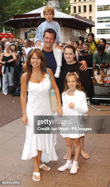 Former glamour model Linda Lusardi with her husband Sam Kane and family arrives for the UK premiere of New York Minute, at the Odeon West End in...