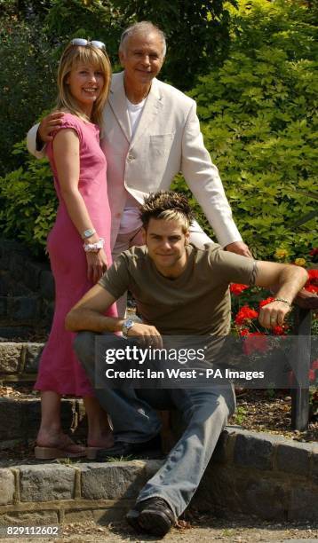 The stars, from left to right; Sophie Lawrence, David Essex and Scott Robinson pose for photographers during a photocall to promote the new theatre...