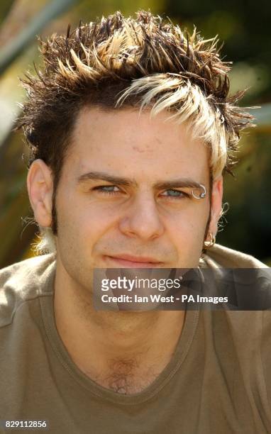 Former member of boy band 5ive Scott Robinson poses for photographers during a photocall to promote the new theatre production of Boogie Nights 2 at...