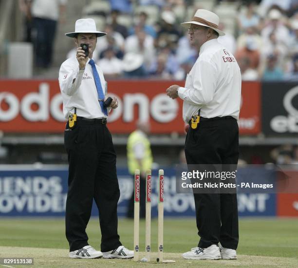 Umpire's Simon Taufel and Darrell Hair use their light meter in the middle during the first day of the second npower Test match between England and...